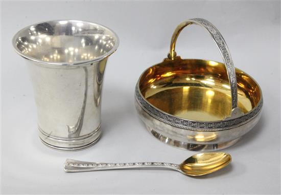 A Danish silver beaker, a post 1958 Soviet Union 875 standard preserve basket and an unmarked white metal preserve spoon.